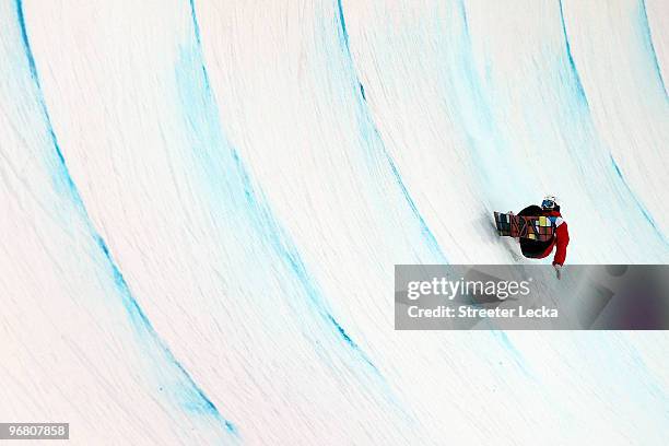 Ben Kilner of Great Britain and Northern Ireland crashes while competing in a run during the semifinal of the Snowboard Men's Halfpipe on day six of...