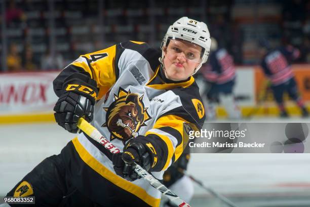 Arthur Kaliyev of Hamilton Bulldogs warms up with a shot on net against the Regina Pats at Brandt Centre - Evraz Place on May 25, 2018 in Regina,...