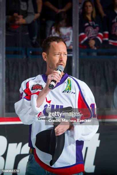 Canadian country singer Paul Brandt sings the national anthem at the start of the semi-final game between the Regina Pats and the Hamilton Bulldogs...