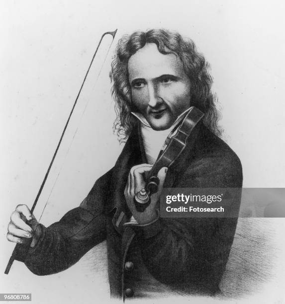 Lithograph of Niccolo Paganini playing the violin, circa 1800s. .