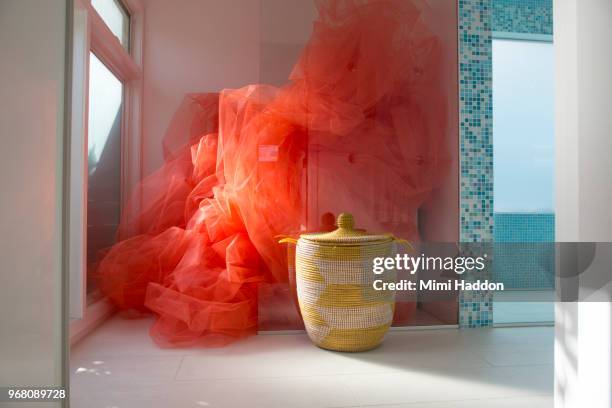 designer bathroom filled with bright orange fabric - huge task stock pictures, royalty-free photos & images