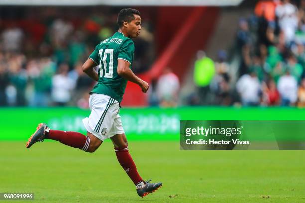 Giovani Dos Santos of Mexico celebrates after scoring the first goal of his team during the International Friendly match between Mexico v Scotland at...