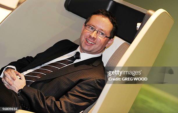 Qantas Airways chief executive Alan Joyce poses in the Qantas Centre of Service Excellence after announcing company half-year results in Sydney on...