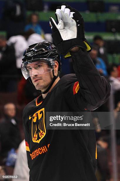 Jochen Hecht of Germany leaves the ice after losing 2-0 to Sweden during the ice hockey men's preliminary game on day 6 of the Vancouver 2010 Winter...