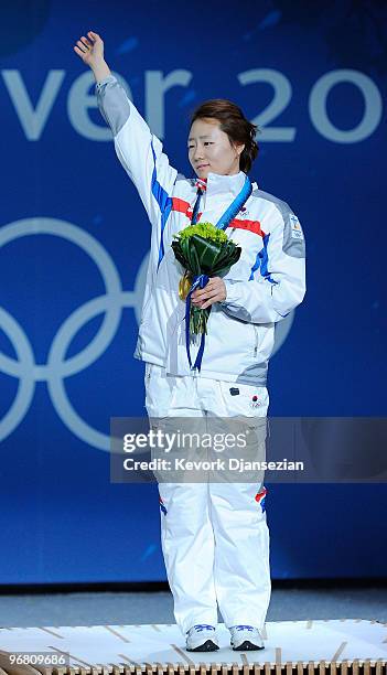 Sang-Hwa Lee of South Korea celebrates with her gold medal during the medal ceremony for the Ladies' 500m Speed Skating on day 6 of the Vancouver...