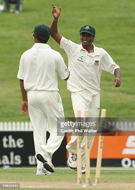 Rubel Hossain of Bangladesh celebrates his runout of Tim McIntosh of New Zealand during day four of the First Test match between New Zealand and...