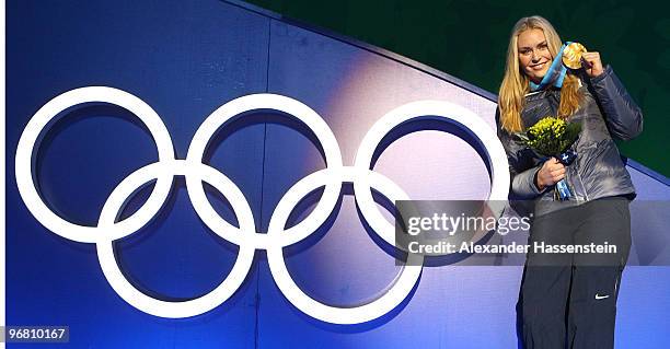 Lindsey Vonn of the United States celebrates with her gold medal during the medal ceremony for the Alpine Skiing Ladies Downhill on day 6 of the...