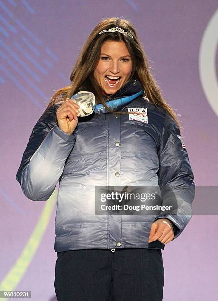 Julia Mancuso of the United States celebrates with her silver medal during the medal ceremony for the Alpine Skiing Ladies Downhill on day 6 of the...