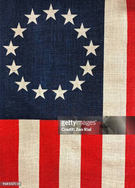 betsy ross flag on display in a store for sale - betsy ross flag stockfoto's en -beelden