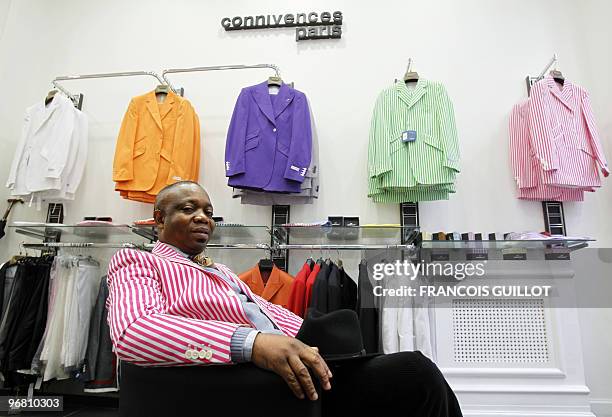 Lifestyle-fashion-Africa-France,FEATURE, by Yomi Abiola Jocelyn Armel poses at his men's clothing boutique on February 10, 2010 in Paris. Armel, the...