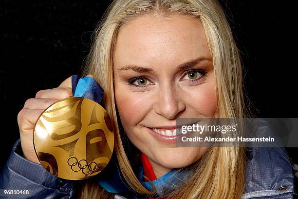 Lindsey Vonn of the United States celebrates with her gold medal during the medal ceremony for the Alpine Skiing Ladies Downhill on day 6 of the...