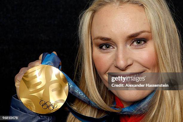 Lindsey Vonn of the United States celebrates with her gold medal during the medal ceremony for the Alpine Skiing Ladies Downhill on day 6 of the...