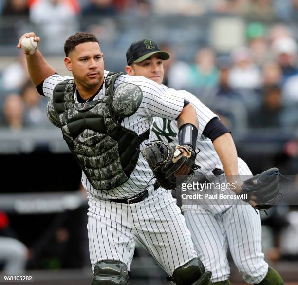 Catcher Gary Sanchez of the New York Yankees throws to first base in an MLB baseball game against the Los Angeles Angels of Anaheim on May 27, 2018...