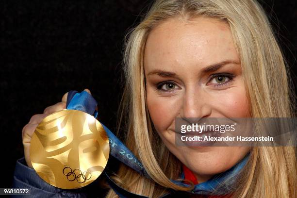 Lindsey Vonn of the United States celebrates with her gold medal during the medal ceremony for the Alpine Skiing Ladies Downhill on day 6 of the...