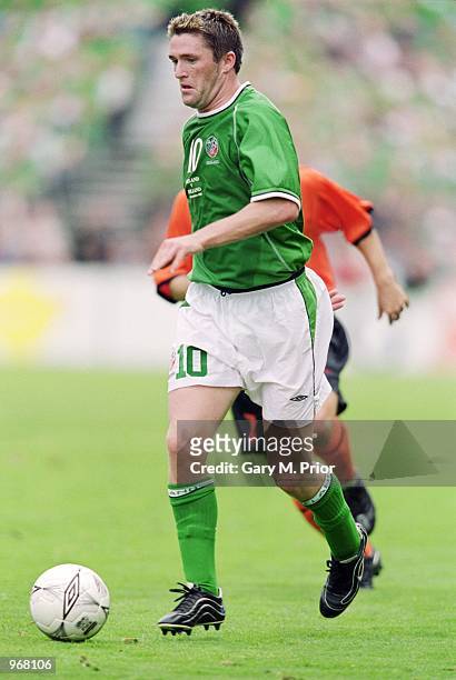 Robbie Keane of Republic of Ireland runs with the ball during the FIFA World Cup 2002 Group Two Qualifying match against Holland played at Lansdowne...