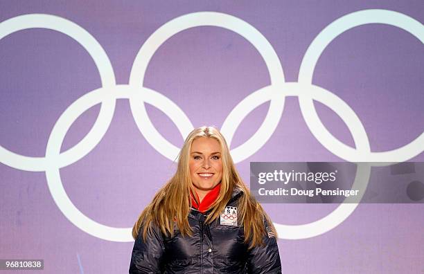 Lindsey Vonn of the United States celebrates winning the gold medal during the medal ceremony for the Alpine Skiing Ladies Downhill on day 6 of the...