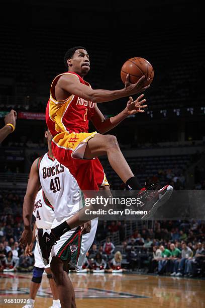 Garrett Temple of the Houston Rockets goes up for a layup against Kurt Thomas of the Milwaukee Bucks on February 17, 2010 at the Bradley Center in...