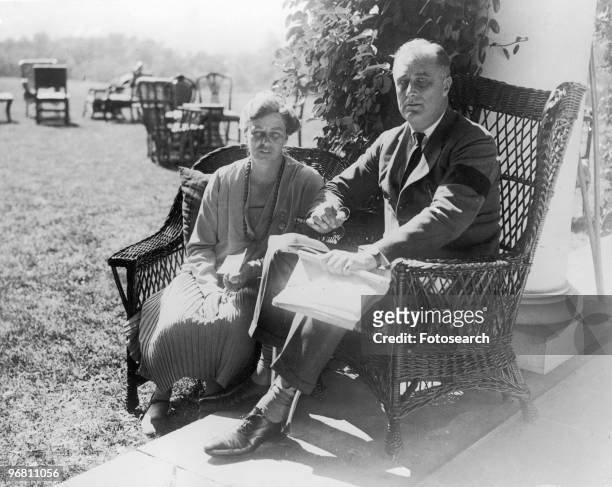 President Franklin D. Roosevelt seated and wife Eleanor Roosevelt in Hyde Park New York, September 16, 1927. .