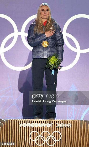 Lindsey Vonn of the United States celebrates with her gold medal during the medal ceremony for the Alpine Skiing Ladies Downhill on day 6 of the...