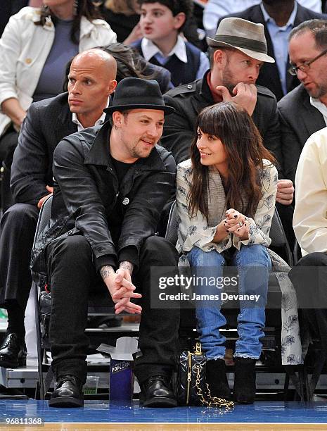 Joel Madden and Nicole Richie attend the Chicago Bulls vs New York Knicks game at Madison Square Garden on February 17, 2010 in New York City.