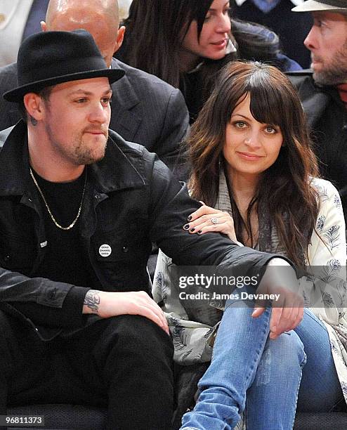 Joel Madden and Nicole Richie attend the Chicago Bulls vs New York Knicks game at Madison Square Garden on February 17, 2010 in New York City.