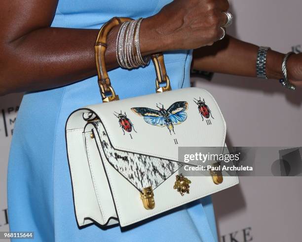 Actress Vanessa Bell Calloway , handbag detail, attends the Ladylike Foundation's 2018 Annual Women Of Excellence Scholarship Luncheon at The Beverly...