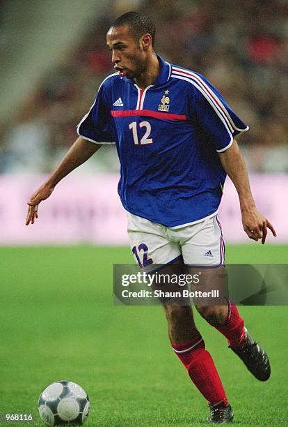 Thierry Henry of France runs with the ball during the International Friendly match against Portugal played at the Stade de France, in Paris, France....