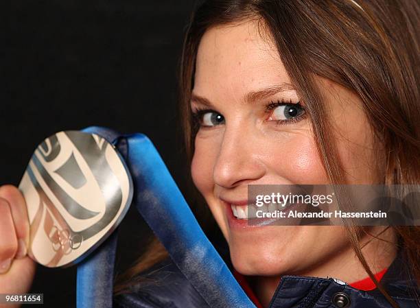 Julia Mancuso of the United States celebrates with her silver medal during the medal ceremony for the Alpine Skiing Ladies Downhill on day 6 of the...