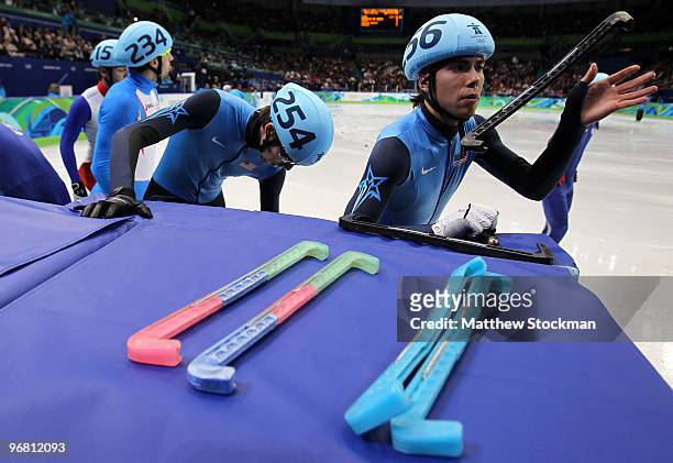 Apolo Anton Ohno of the United States, Travis Jayner of the United States, Nicola Rodigari of Italy and Thibaut Fauconnet of France take to the ice...