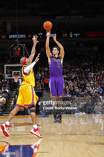 Omar Casspi of the Sacramento Kings shoots a jumper against Corey Maggette of the Golden State Warriors on February 17, 2010 at Oracle Arena in...