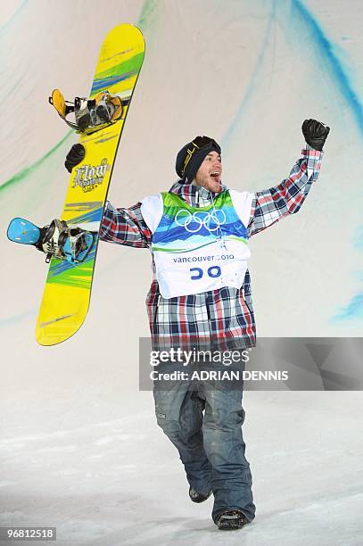 S Scott Lago celebrates after the men's Snowboard Halfpipe final run 1on February 17, 2010 at Cypress Mountain, north of Vancouver during the...