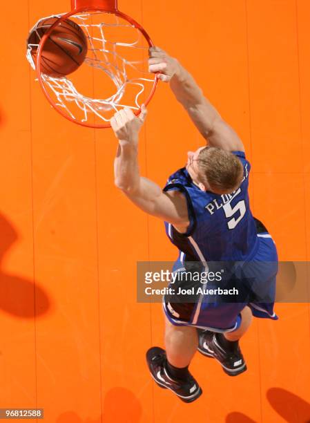 Mason Plumlee of the Duke Blue Devils dunks the ball against the Miami Hurricanes on February 17, 2010 at the BankUnited Center in Coral Gables,...