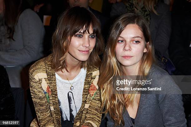 Alexa Chung and guest attend 3.1 Phillip Lim during Mercedes-Benz Fashion Week Fall 2010 at Bryant Park on February 17, 2010 in New York City.