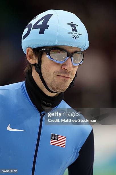 Travis Jayner of the United States looks on during the Short Track Speed Skating heats on day 6 of the Vancouver 2010 Winter Olympics at Pacific...