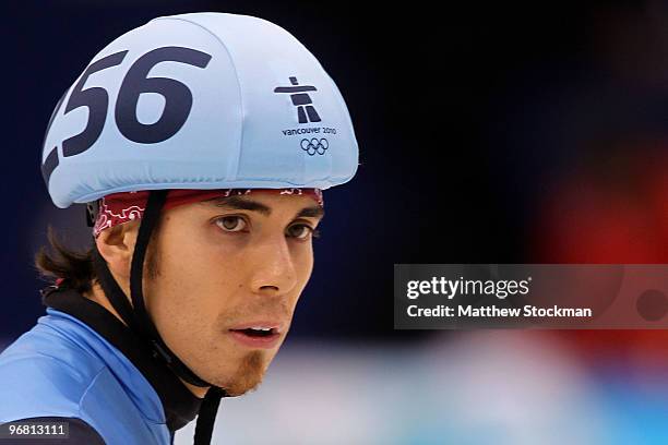 Apolo Anton Ohno of the United States looks on during the Short Track Speed Skating heats on day 6 of the Vancouver 2010 Winter Olympics at Pacific...