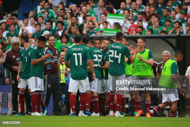 Players of Mexico celebrates a scored goal by Giovani Dos Santos during the International Friendly match between Mexico and Scotland at Estadio...