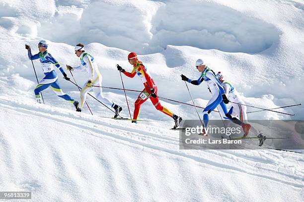 Kalle Lassila of Finland leads the field during the Men's Cross-Country Individual Sprint C Quarter-Final on day 6 of the 2010 Vancouver Winter...