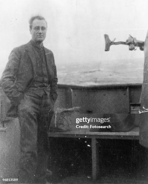 President Franklin D. Roosevelt standing on a boat, circa 1920s. .