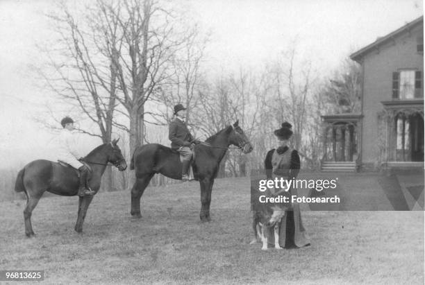 Young President Franklin D. Roosevelt and father on horseback with his mother holding the family dog in Hyde Park New York, circa 1891. .