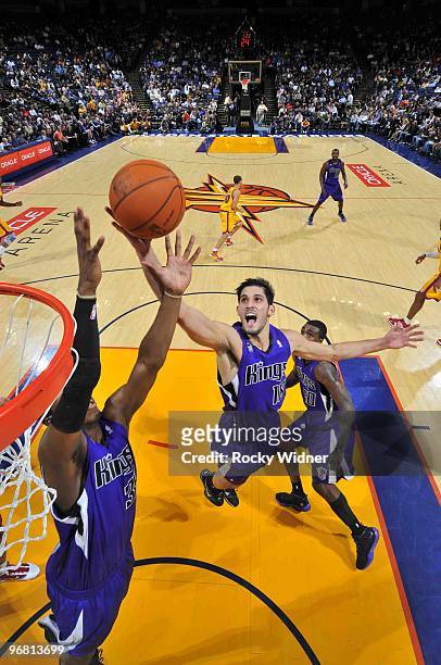 Omri Casspi of the Sacramento Kings grabs a rebound against the Golden State Warriors on February 17, 2010 at Oracle Arena in Oakland, California....