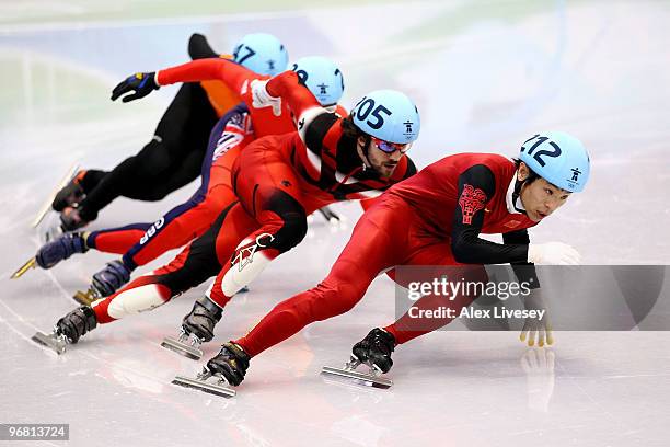 Ma Yunfeng of China leads Charles Hamelin of Canada, Jon Eley of Great Britain and Northern Ireland and Sjinkie Knegt of Netherlands in the Short...