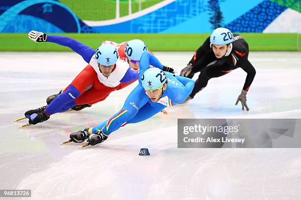 Yuri Confortola of Italy leads Thibaut Fauconnet of France, Semion Elistratov of Russia and Assen Pandov of Bulgaria in the Short Track Speed Skating...