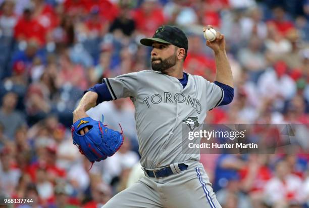 Starting pitcher Jaime Garcia of the Toronto Blue Jays throws a pitch during a game against the Philadelphia Phillies at Citizens Bank Park on May...