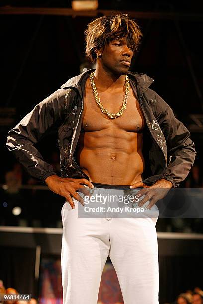 Terrell Owens walks the runway at the A*Muse fashion show at Amnesia NYC on February 17, 2010 in New York City.