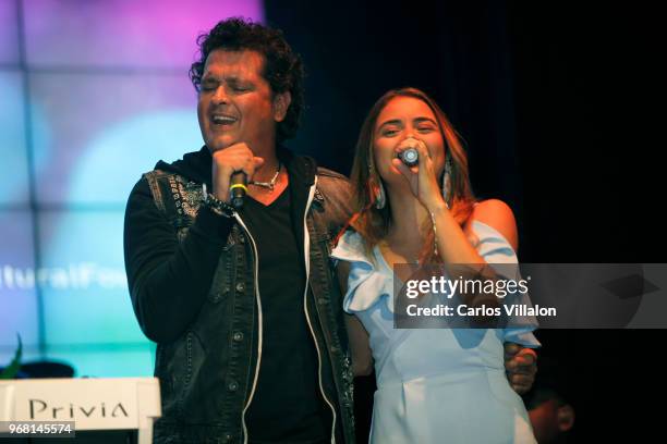 Singer Carlos Vives and musician Nicolle Horbath perform during the Latin GRAMMY Cultural Foundation's Scholarship Presentation on June 5, 2018 in...