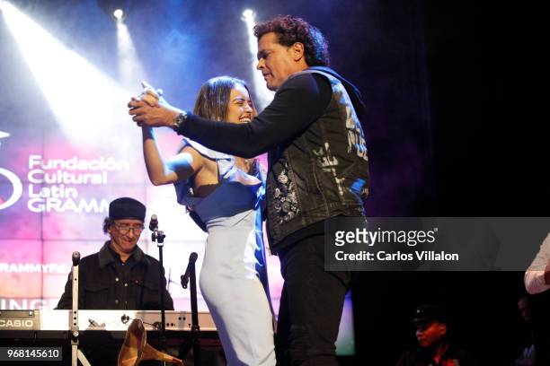 Singer Carlos Vives and musician Nicolle Horbath perform during the Latin GRAMMY Cultural Foundation's Scholarship Presentation on June 5, 2018 in...