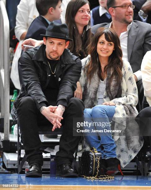 Joel Madden and Nicole Richie attend the Chicago Bulls vs New York Knicks game at Madison Square Garden on February 17, 2010 in New York City.