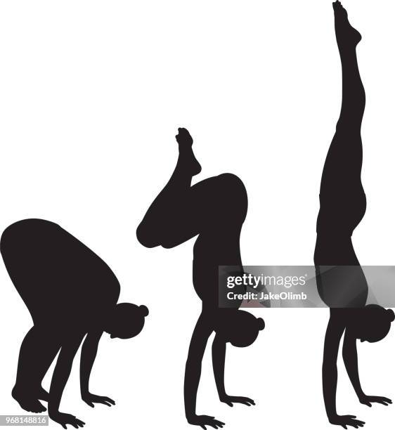 woman doing handstand silhouettes - handstand stock illustrations