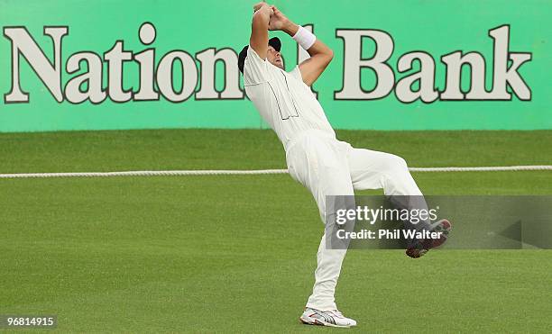 Darryl Tuffey of New Zealand takes the catch to dismiss Tamim Iqbal Khan of Bangladesh during day four of the First Test match between New Zealand...