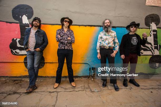 Justin Smith, Dan Cervantes, Ethan Miller and Jeff EcElroy of the band Howlin Rain pose for a portrait before their set at Fingerprints on June 5,...